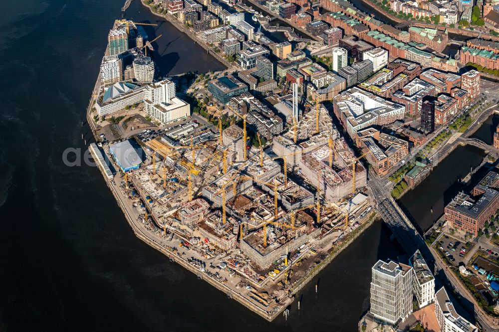 Hamburg from above - Construction site for the new building complex of the shopping center at Ueberseequartier at Chicagokai - Osakaallee in the area of the former Grasbrooks in the Hafencity district in Hamburg, Germany