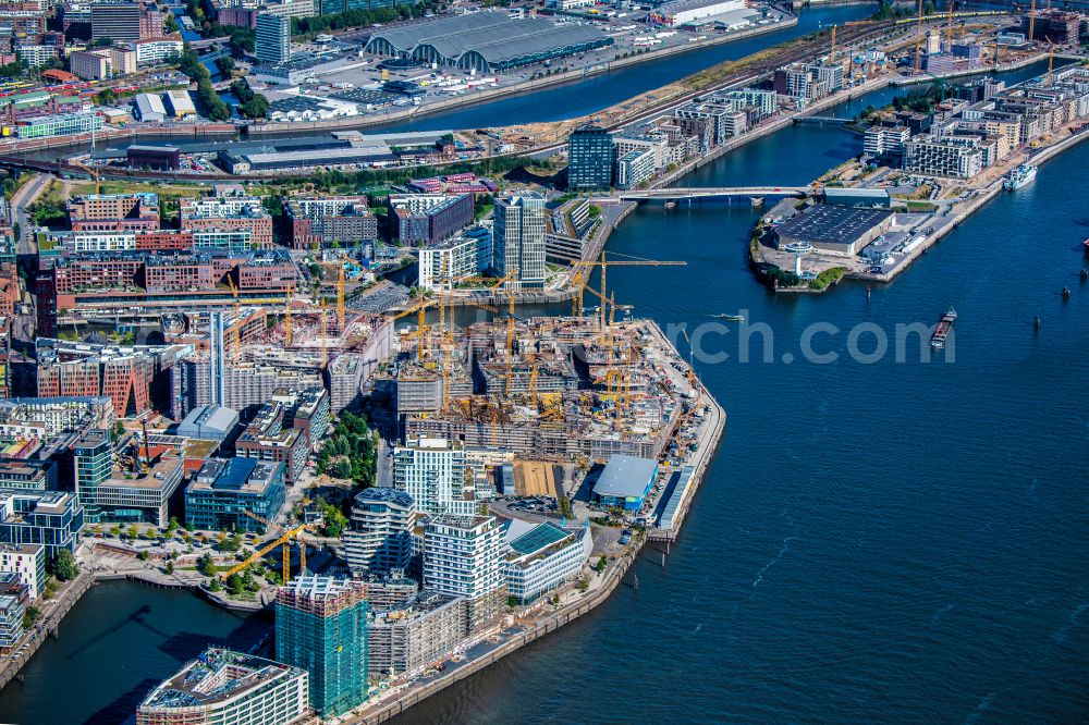 Aerial photograph Hamburg - Construction site for the new building complex of the shopping center at Ueberseequartier at Chicagokai - Osakaallee in the area of the former Grasbrooks in the Hafencity district in Hamburg, Germany