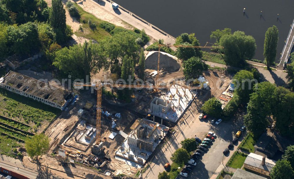 Potsdam from the bird's eye view: Baustelle / Neubau betreutes Wohnen der Johanniter-Unfall-Hilfe e.V. an der Zeppelinstraße Ecke Kastanienallee am Ufer des Tiefer See im Stadtteil Berliner Vorstadt in Potsdam. Construction site of a residential care home with assisted living in Potsdam.