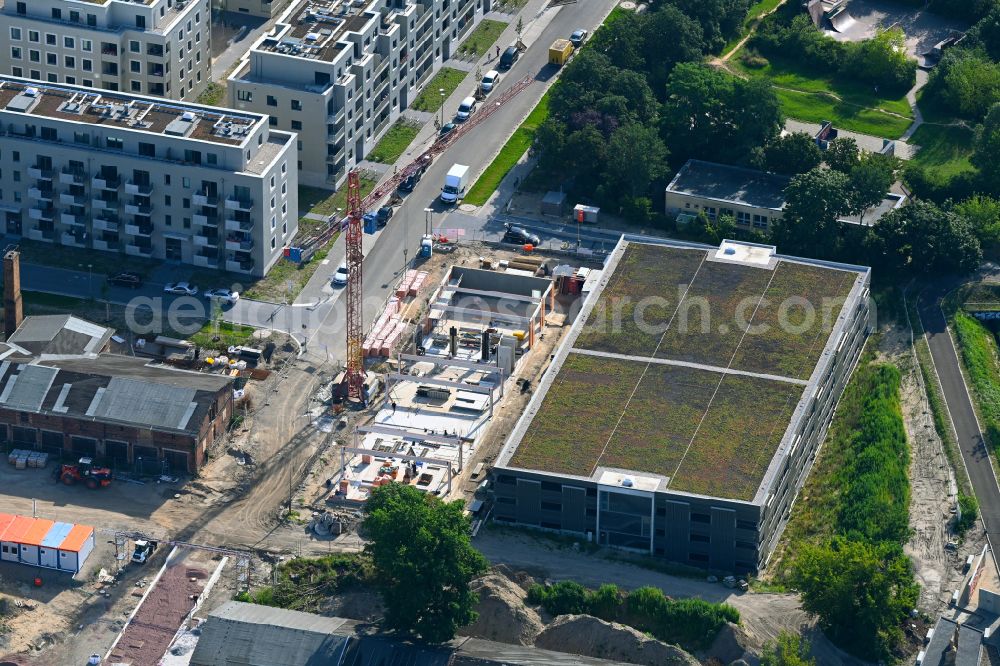 Aerial image Berlin - Construction site of the depot of the with Werkstatt of GESOBAU on street Elfriede-Bruening-Strasse - Alt-Hellersdorf - Sarah-Kirsch-Strasse in the district Hellersdorf in Berlin, Germany