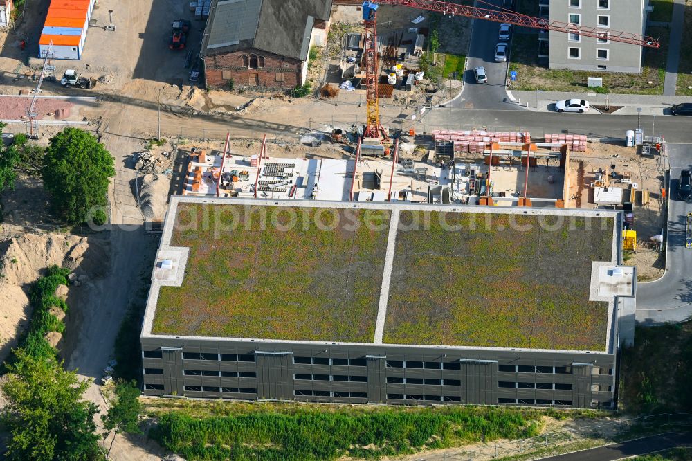 Berlin from above - Construction site of the depot of the with Werkstatt of GESOBAU on street Elfriede-Bruening-Strasse - Alt-Hellersdorf - Sarah-Kirsch-Strasse in the district Hellersdorf in Berlin, Germany