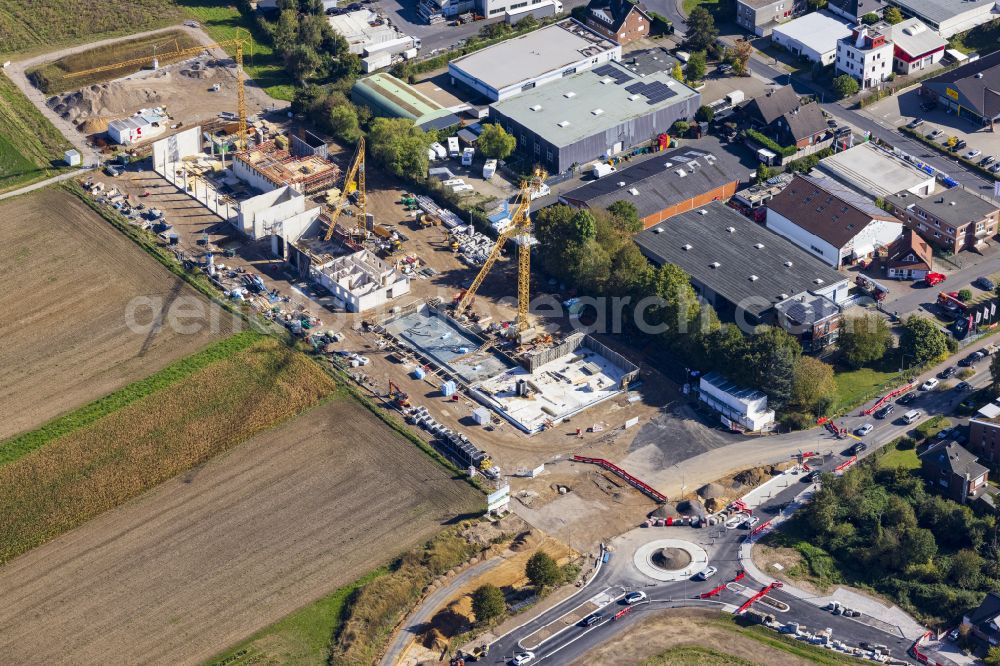 Neuss from the bird's eye view: New construction on the fire station area of the fire depot on street Am Hagelkreuz in the district Hoisten in Neuss in the state North Rhine-Westphalia, Germany