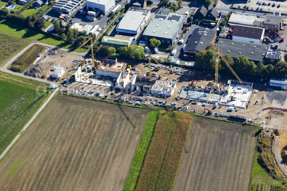 Aerial photograph Neuss - New construction on the fire station area of the fire depot on street Am Hagelkreuz in the district Hoisten in Neuss in the state North Rhine-Westphalia, Germany