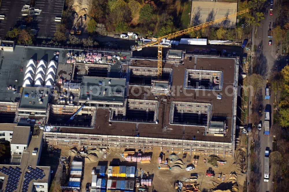 Aerial photograph Berlin - Construction site for the construction of a new library of small departments and a scientific library of the Free University ( FU ) at Fabeckstrasse in Berlin Dahlem