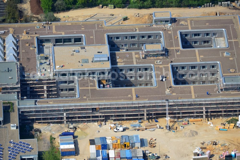 Aerial photograph Berlin - Construction site for the construction of a new library of small departments and a scientific library of the Free University ( FU ) at Fabeckstrasse in Berlin Dahlem