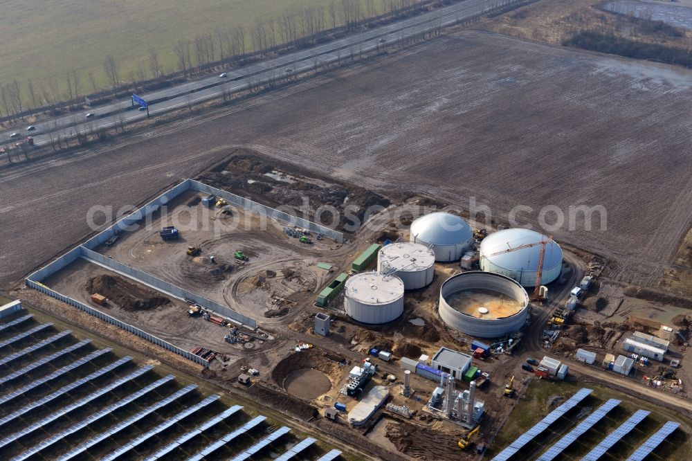 Aerial photograph Oberkrämer - Construction of a biogas - plant on solar park in Oberkrämer in Brandenburg. The solar energy and photovoltaic location for renewable energy provides 36% of EEG power