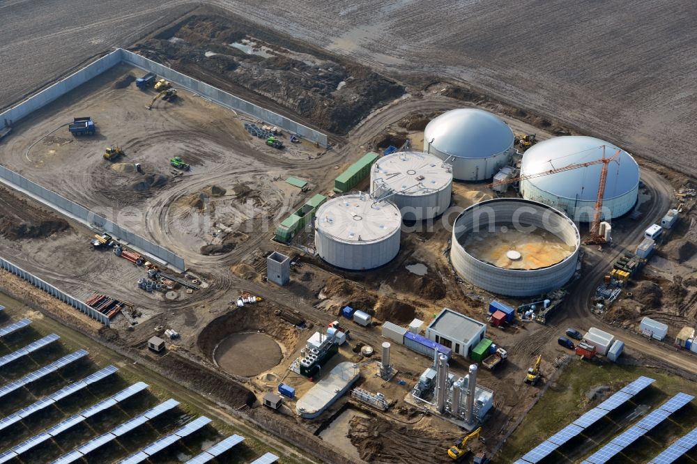 Oberkrämer from above - Construction of a biogas - plant on solar park in Oberkrämer in Brandenburg. The solar energy and photovoltaic location for renewable energy provides 36% of EEG power