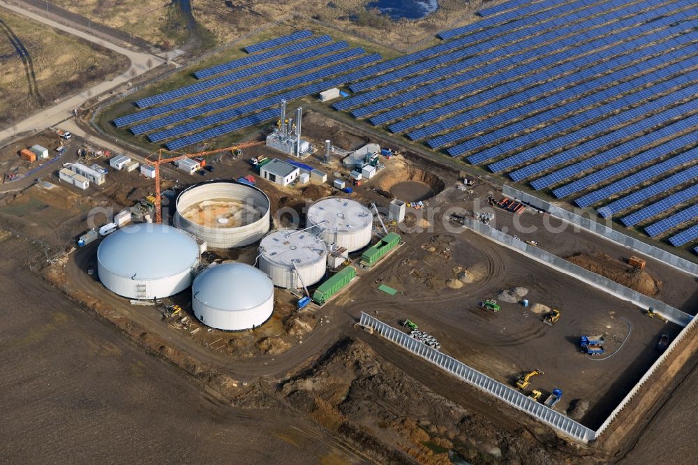 Oberkrämer from above - Construction of a biogas - plant on solar park in Oberkrämer in Brandenburg. The solar energy and photovoltaic location for renewable energy provides 36% of EEG power