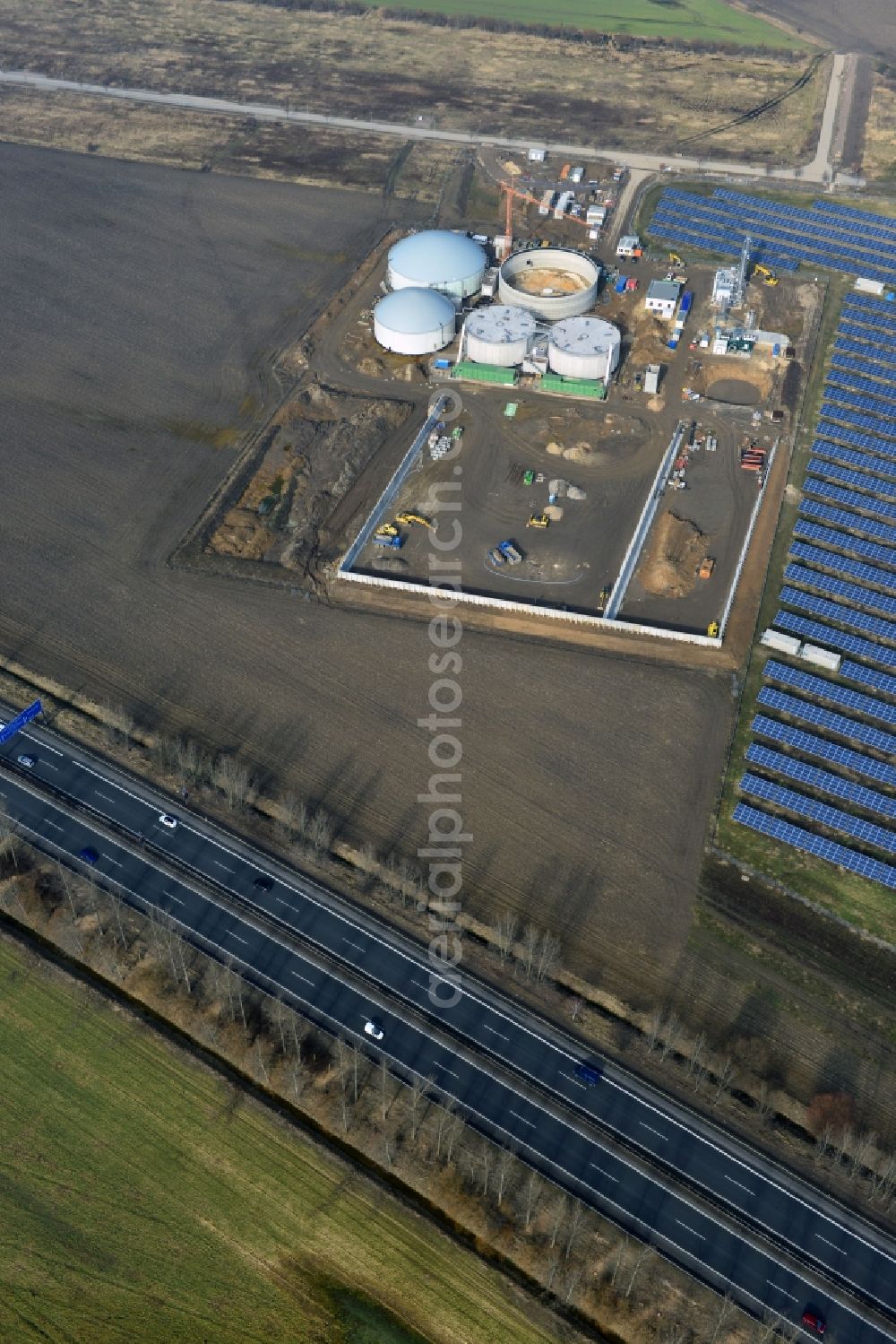 Aerial image Oberkrämer - Construction of a biogas - plant on solar park in Oberkrämer in Brandenburg. The solar energy and photovoltaic location for renewable energy provides 36% of EEG power