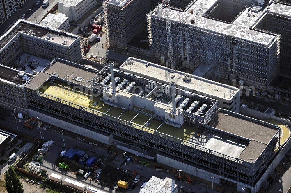 Aerial image Berlin - Blick auf die Baustelle des Neubaus der BND-Zentrale an der Chausseestraße im Bezirk Mitte. Der Bundesnachrichtendienst (BND) baut auf einem ca. 10 Hektar großen Gelände für rund 4.000 Mitarbeiter. Das Gebäude wird nach Plänen des Berliner Architektenbüros Büros Kleihues + Kleihues errichtet. View of the construction site to the new BND headquarters at Chausseestrass in the district Mitte. The Federal Intelligence Service (BND) builds on a 10 acre site for about 4,000 employees. It is built according to plans by the Berlin architects offices Kleihues + Kleihues.