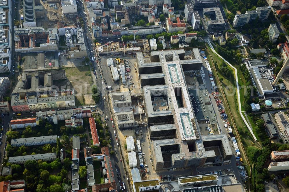 Aerial photograph Berlin - View of the construction site to the new BND headquarters at Chausseestrass in the district Mitte. The Federal Intelligence Service (BND) builds on a 10 acre site for about 4,000 employees. It is built according to plans by the Berlin architects offices Kleihues Kleihues