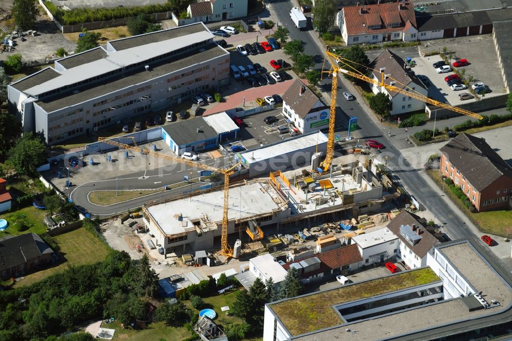 Wolfsburg from the bird's eye view: Construction site to build a new office and commercial building on Alessandro-Volta-Strasse in Wolfsburg in the state Lower Saxony, Germany