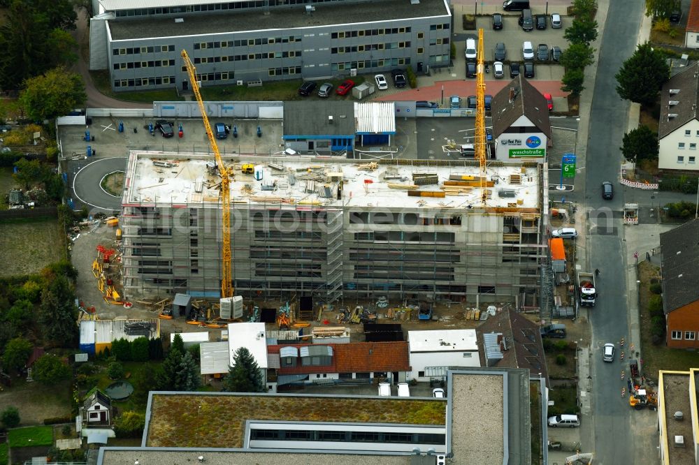 Wolfsburg from the bird's eye view: Construction site to build a new office and commercial building on Alessandro-Volta-Strasse in Wolfsburg in the state Lower Saxony, Germany