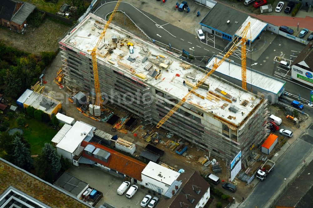 Wolfsburg from the bird's eye view: Construction site to build a new office and commercial building on Alessandro-Volta-Strasse in Wolfsburg in the state Lower Saxony, Germany