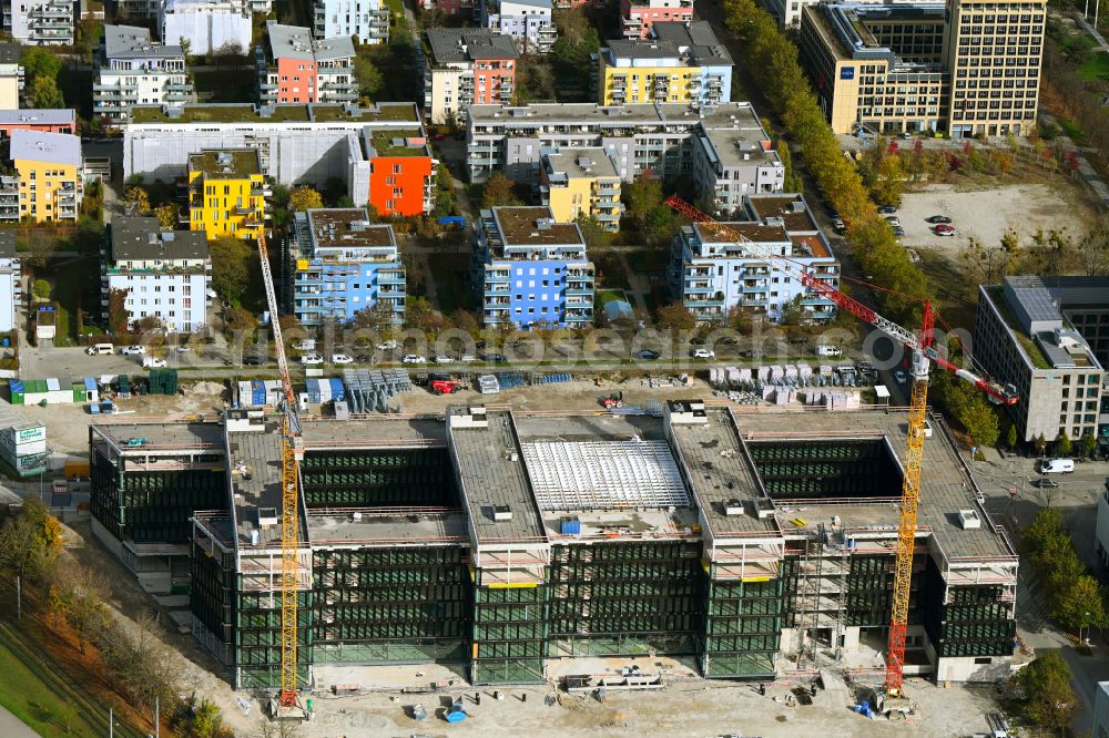 München from the bird's eye view: Construction site to build a new office and commercial building on Anni-Albers-Strasse - Lyonel-Feininger-Strasse in the district Schwabing in Munich in the state Bavaria, Germany