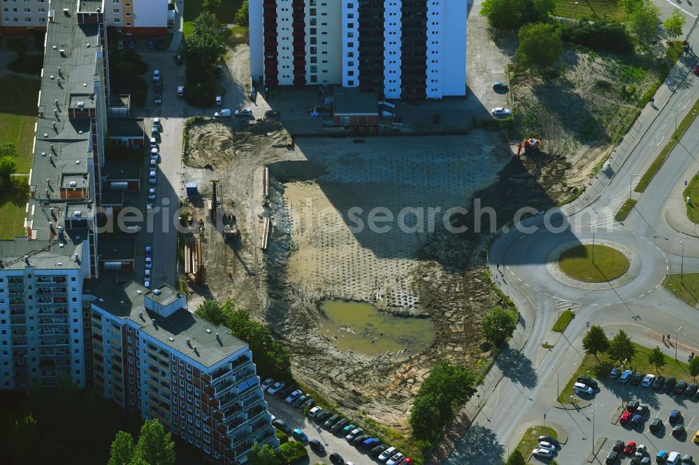 Aerial image Rostock - Construction site to build a new office and commercial building on Bahnhofsvorplatz in the district Suedstadt in Rostock in the state Mecklenburg - Western Pomerania, Germany