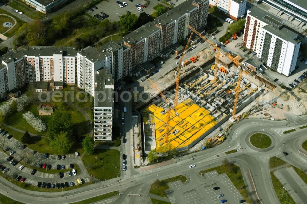 Aerial photograph Rostock - Construction site to build a new office and commercial building on Bahnhofsvorplatz in the district Suedstadt in Rostock in the state Mecklenburg - Western Pomerania, Germany