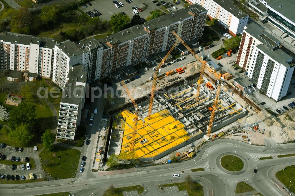 Rostock from the bird's eye view: Construction site to build a new office and commercial building on Bahnhofsvorplatz in the district Suedstadt in Rostock in the state Mecklenburg - Western Pomerania, Germany