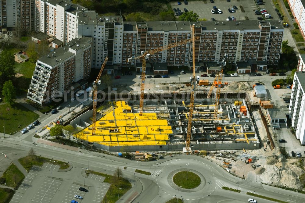 Aerial photograph Rostock - Construction site to build a new office and commercial building on Bahnhofsvorplatz in the district Suedstadt in Rostock in the state Mecklenburg - Western Pomerania, Germany