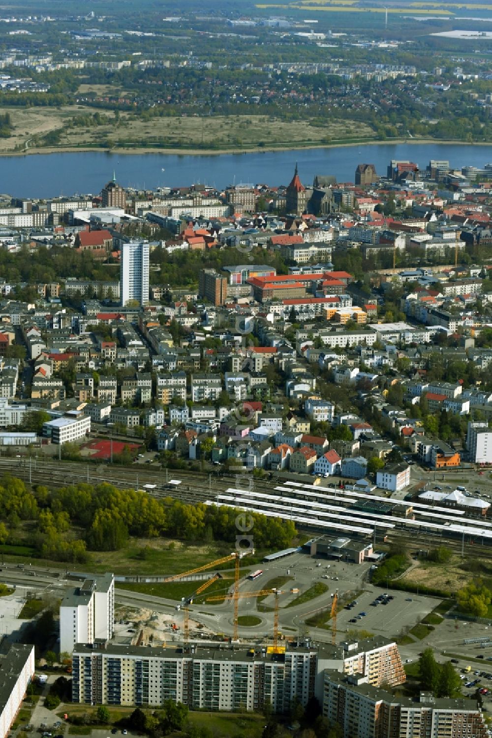 Aerial image Rostock - Construction site to build a new office and commercial building on Bahnhofsvorplatz in the district Suedstadt in Rostock in the state Mecklenburg - Western Pomerania, Germany