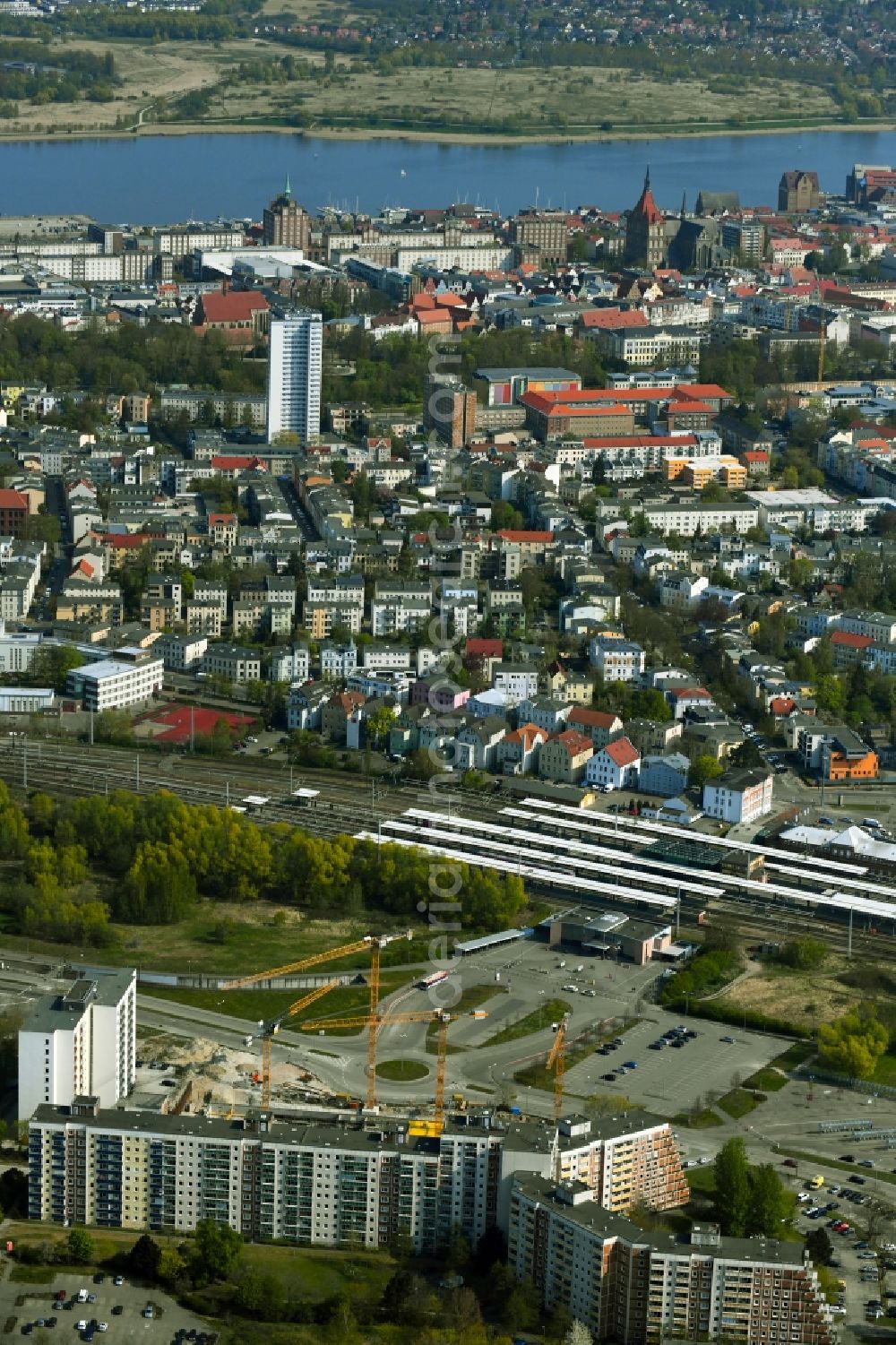 Aerial photograph Rostock - Construction site to build a new office and commercial building on Bahnhofsvorplatz in the district Suedstadt in Rostock in the state Mecklenburg - Western Pomerania, Germany