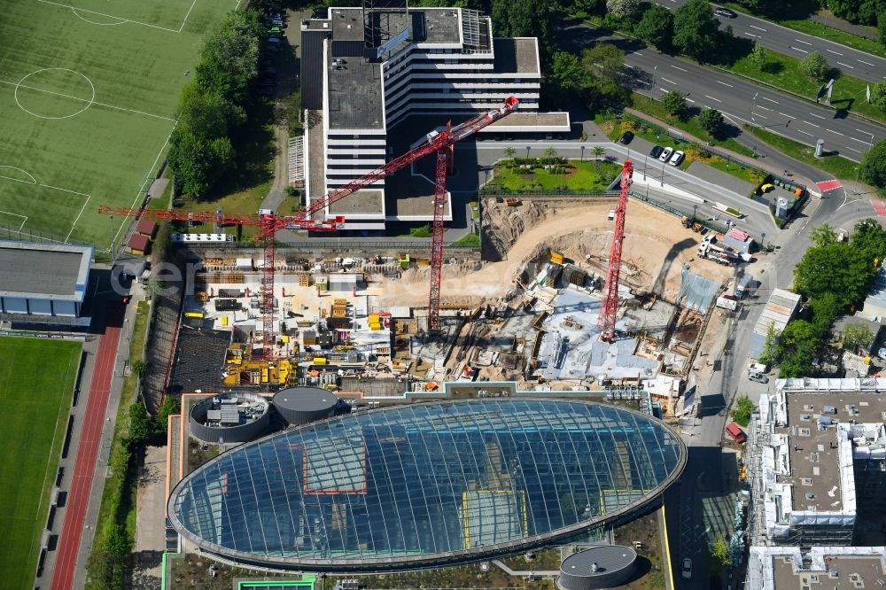 Düsseldorf from the bird's eye view: Construction site to build a new office and commercial building of Becken Holding GmbH on Schwannstrasse in Duesseldorf in the state North Rhine-Westphalia, Germany