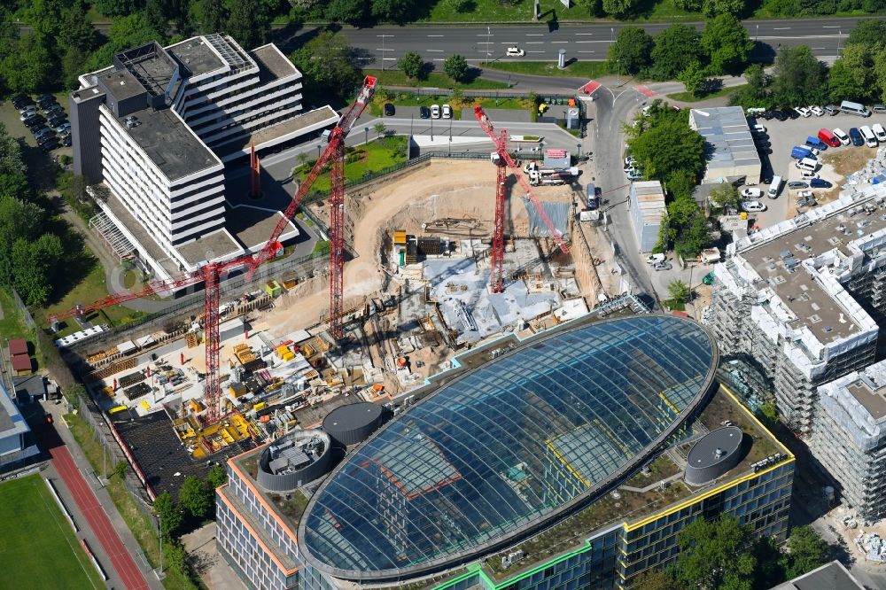 Düsseldorf from the bird's eye view: Construction site to build a new office and commercial building of Becken Holding GmbH on Schwannstrasse in Duesseldorf in the state North Rhine-Westphalia, Germany