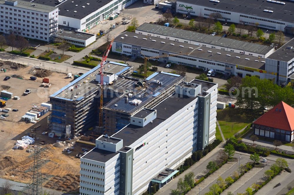 Berlin from the bird's eye view: Construction site to build a new office and commercial building on Beilsteiner Strasse in the district Marzahn in Berlin, Germany