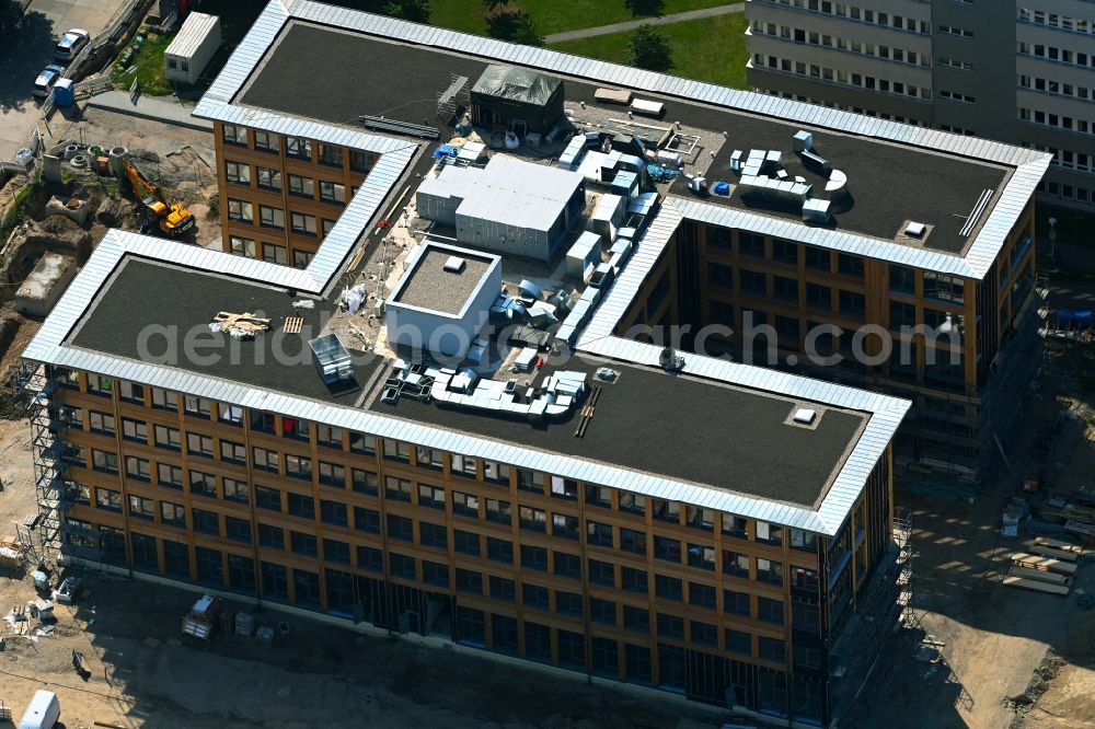 Berlin from above - Construction site to build a new office and commercial building on Beilsteiner Strasse in the district Marzahn in Berlin, Germany