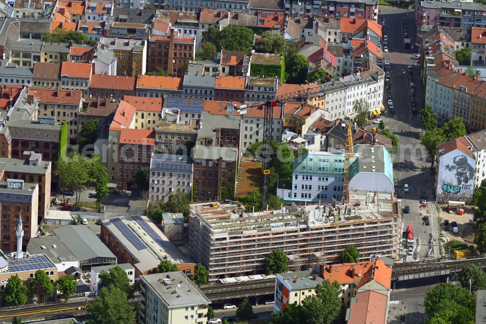 Aerial image Berlin - Construction site to build a new office and commercial building on street Skalitzer Strasse in Berlin, Germany