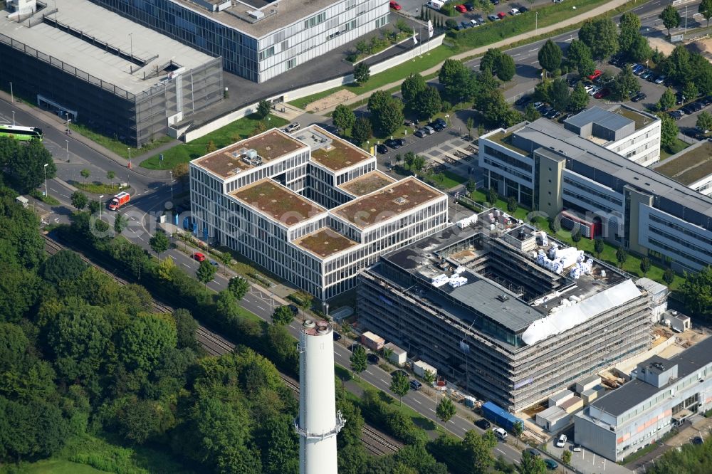 Bonn from the bird's eye view: Construction site to build a new office and commercial building Bonnjour of CODIC Development GMBH between Baunscheidtstrasse and Oscar-Romero-Allee in Bonn in the state North Rhine-Westphalia, Germany