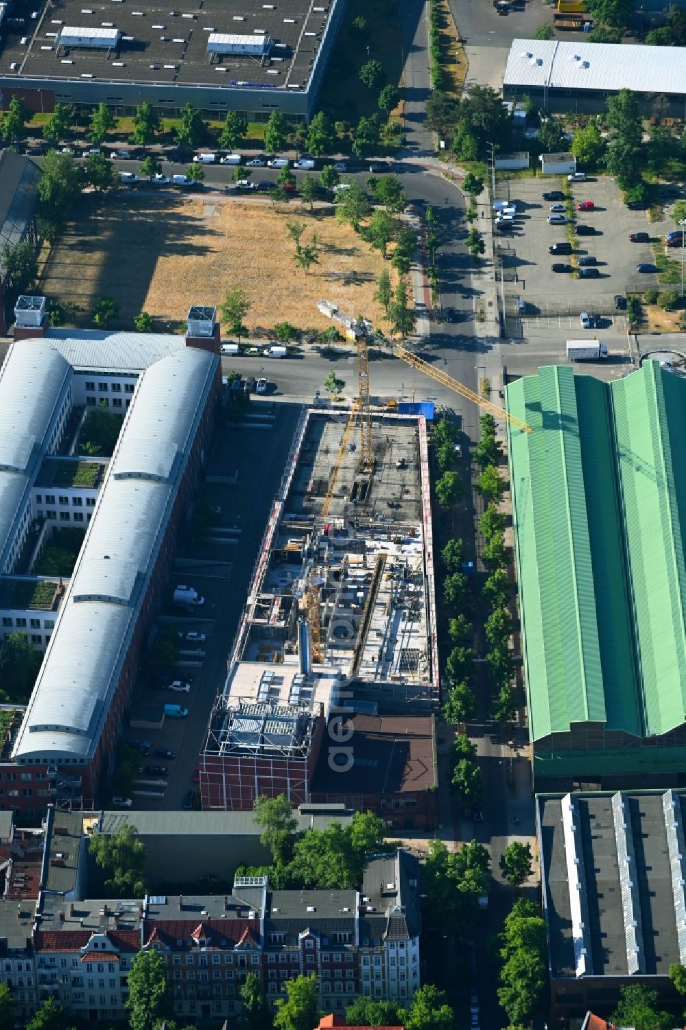 Berlin from the bird's eye view: Construction site to build a new office and commercial building of the project MACHWERK74 Am Borsigturm in the district Tegel in Berlin, Germany