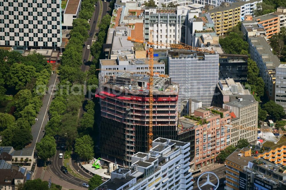 Berlin from the bird's eye view: Construction site to build a new office and commercial building on Budapester Strasse corner Kurfuerstenstrasse in the district Tiergarten in Berlin, Germany