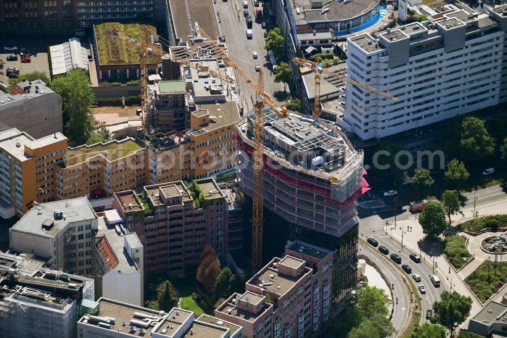 Berlin from the bird's eye view: Construction site to build a new office and commercial building on Budapester Strasse corner Kurfuerstenstrasse in the district Tiergarten in Berlin, Germany