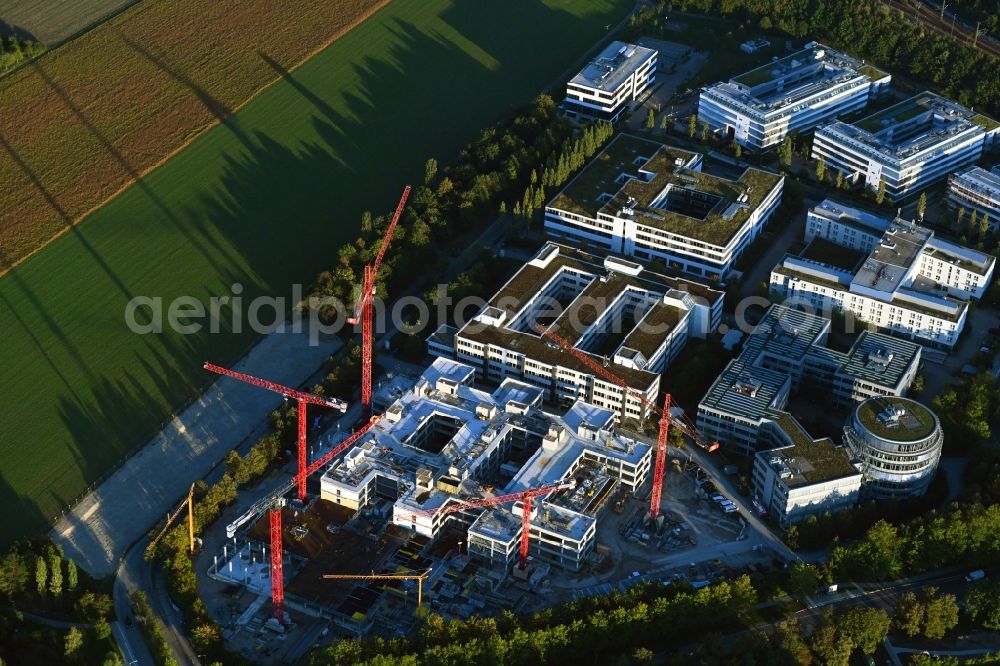 Aschheim from the bird's eye view: Construction site to build a new office and commercial building Campus One on Erdinger Landstrasse - Einsteinring in the district Dornach in Aschheim in the state Bavaria, Germany