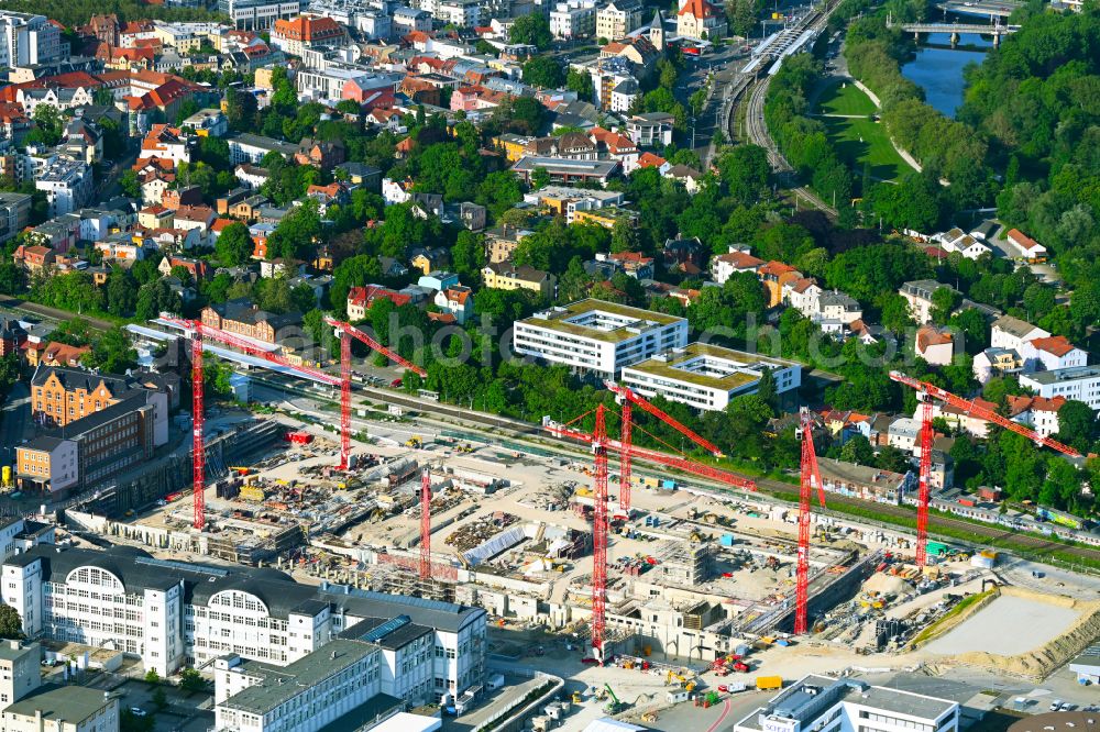 Aerial image Jena - Construction site for the new construction of an office and commercial building for the new company headquarters for the Medical Technology and Research Microscopy Solutions division of Carl Zeiss Meditec AG and Carl Zeiss AG on street Otto-Schott-Strasse in Jena in the state of Thuringia, Germany