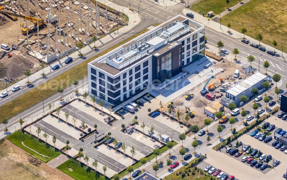 Aerial photograph Dortmund - Construction site to build a new office and commercial building on Carlo-Schmid-Allee corner Walter-Bruch-Strasse in the district Phoenix-West in Dortmund in the state North Rhine-Westphalia, Germany