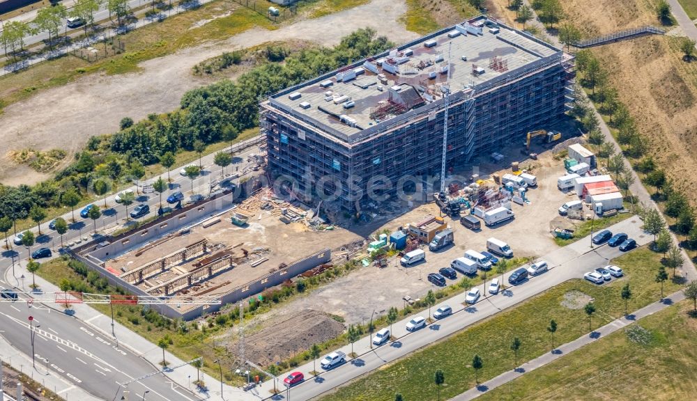 Dortmund from the bird's eye view: Construction site to build a new office and commercial building on Carlo-Schmid-Allee corner Walter-Bruch-Strasse in the district Phoenix-West in Dortmund in the state North Rhine-Westphalia, Germany