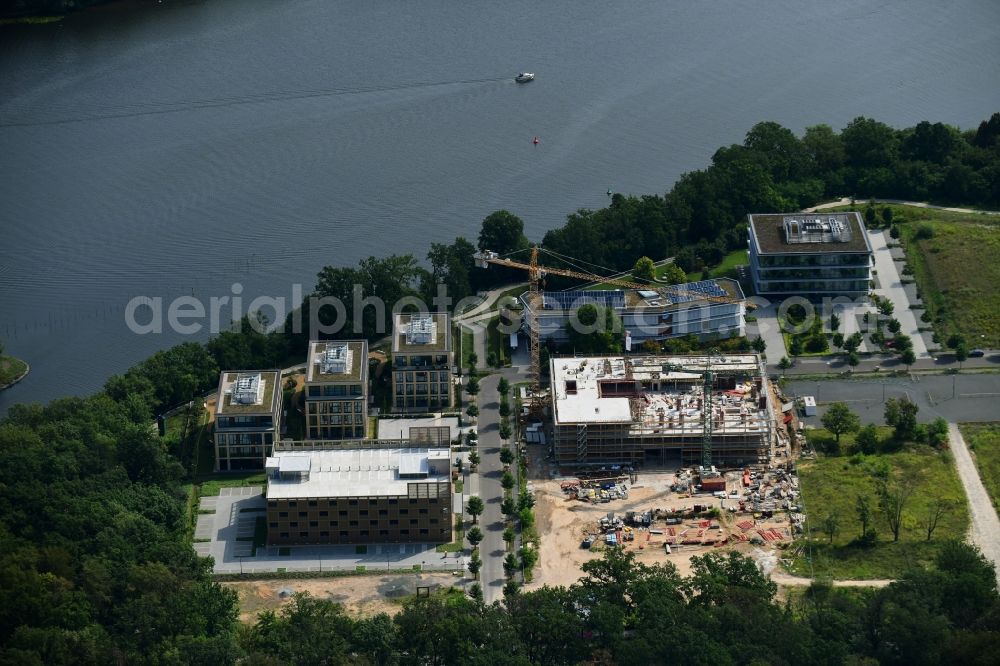 Potsdam from the bird's eye view: Construction site to build a new office and commercial building Cube3 | THINK CAMPUS of Jungfernsee Baumanagement GmbH in Potsdam in the state Brandenburg, Germany