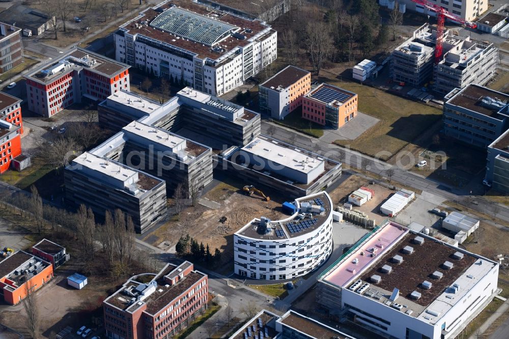 Berlin from the bird's eye view: Construction site to build a new office and commercial building DanGreen an of Magnusstrasse - Max-Planck-Strasse in the district Adlershof in Berlin, Germany