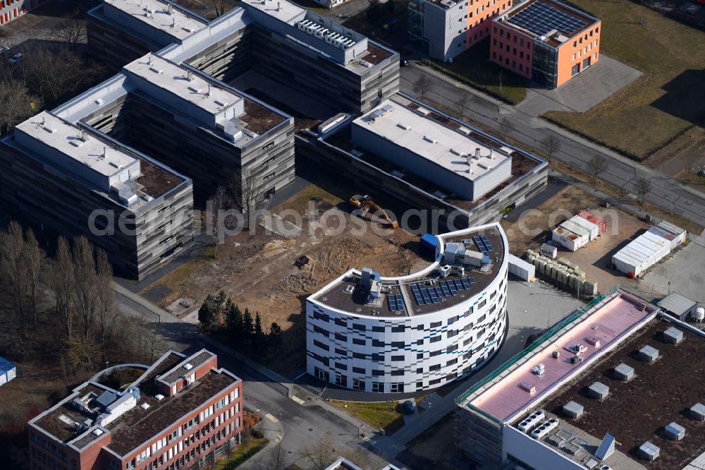 Aerial image Berlin - Construction site to build a new office and commercial building DanGreen an of Magnusstrasse - Max-Planck-Strasse in the district Adlershof in Berlin, Germany