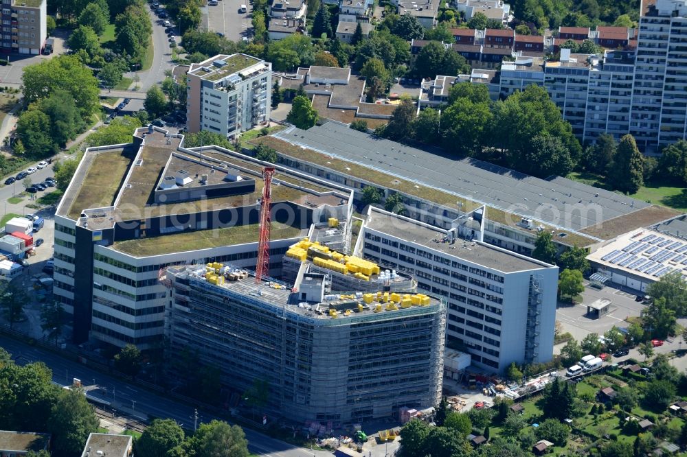 Stuttgart from the bird's eye view: Construction site to build a new office and commercial building Deutsche Rentenversicherung Baden-Wuerttemberg on Adalbert-Stifter-Strasse in the district Freiberg in Stuttgart in the state Baden-Wuerttemberg, Germany