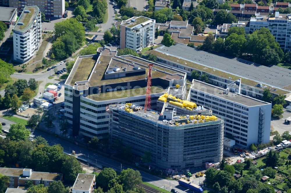 Stuttgart from the bird's eye view: Construction site to build a new office and commercial building Deutsche Rentenversicherung Baden-Wuerttemberg on Adalbert-Stifter-Strasse in the district Freiberg in Stuttgart in the state Baden-Wuerttemberg, Germany