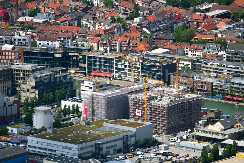 Münster from above - Construction site to build a new office and commercial building Dock14 on street Am Mittelhafen in the district Ost in Muenster in the state North Rhine-Westphalia, Germany