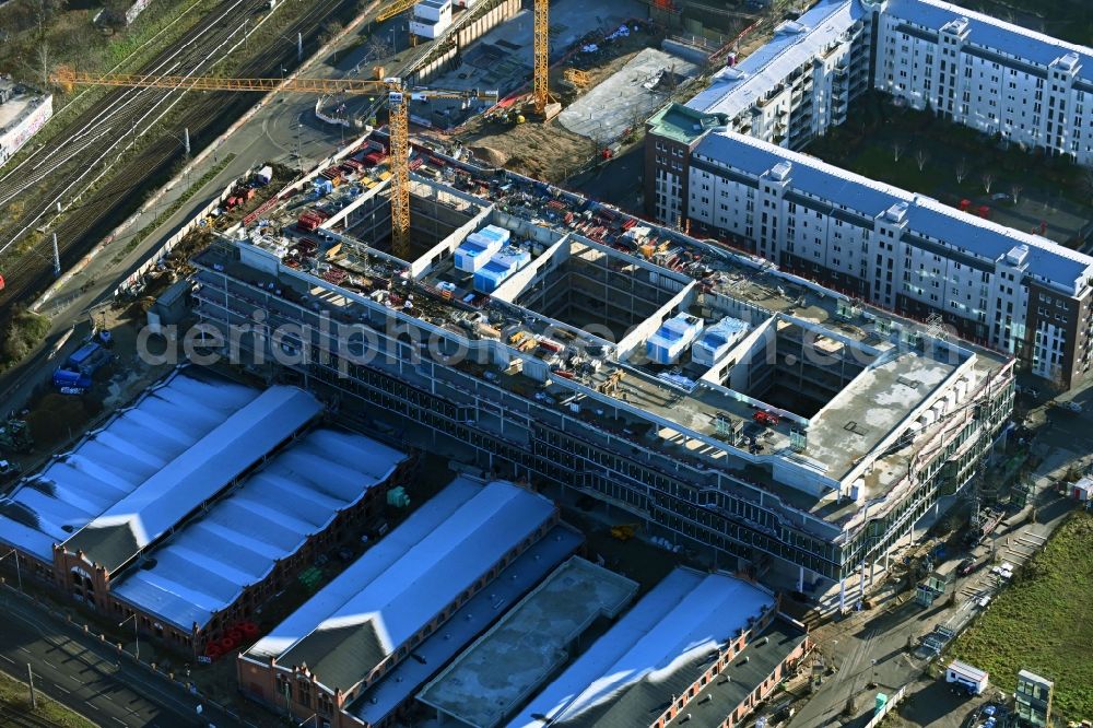 Berlin from above - Construction site to build a new office and commercial building DSTRCT.Berlin on Landsberger Allee, Otto-Ostrowski-Strasse and Hermann-Blankenstein-Strasse in the district Prenzlauer Berg in Berlin, Germany