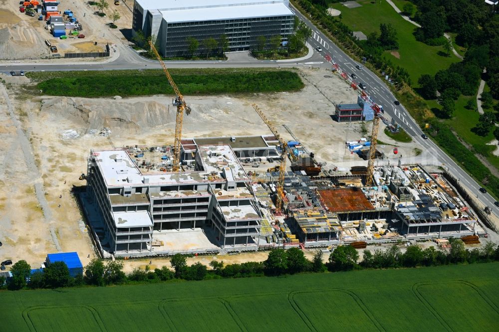 Unterschleißheim from above - Construction site to build a new office and commercial building Emmy-Noether-Ring - Landshuter Strasse in the district Lohhof in Unterschleissheim in the state Bavaria, Germany