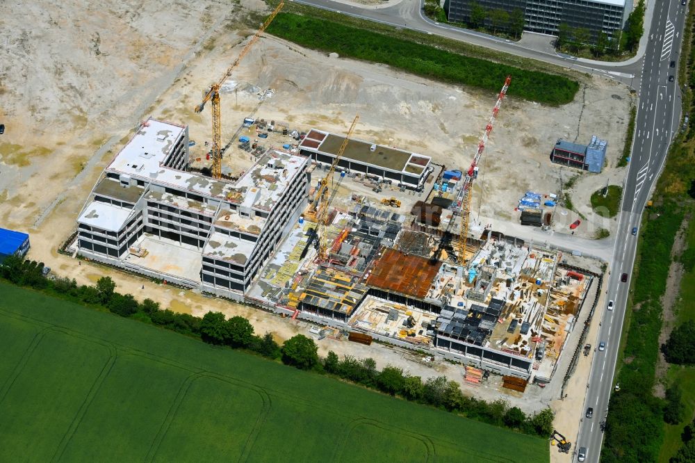 Aerial image Unterschleißheim - Construction site to build a new office and commercial building Emmy-Noether-Ring - Landshuter Strasse in the district Lohhof in Unterschleissheim in the state Bavaria, Germany