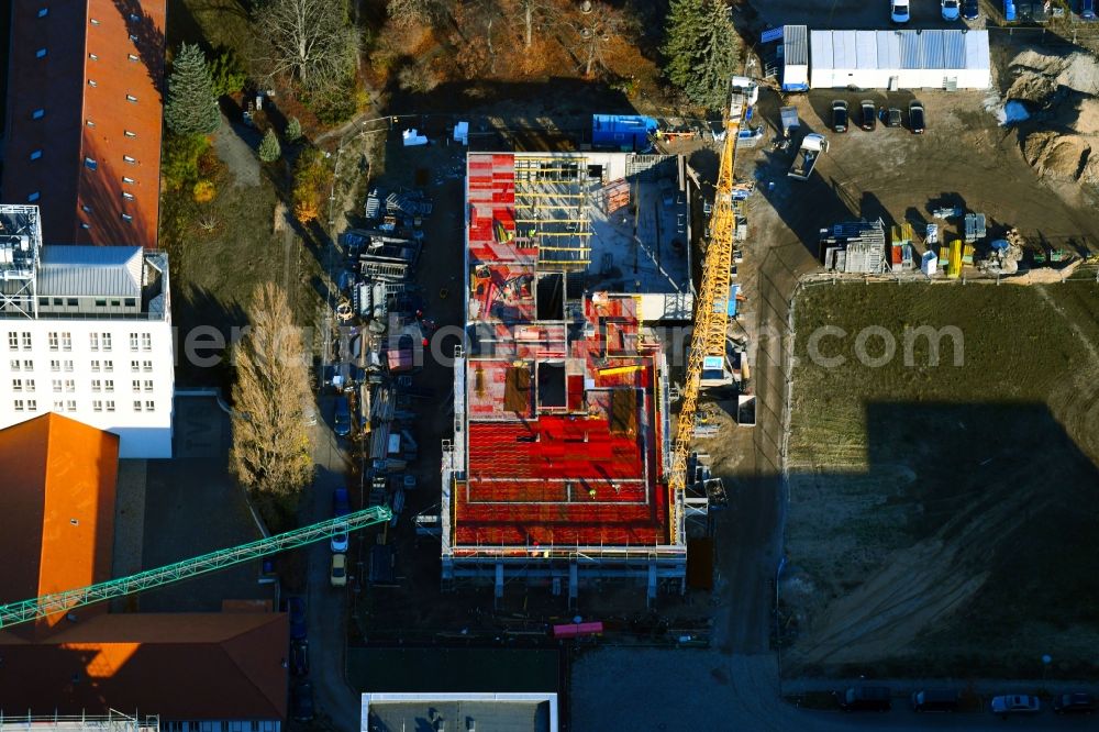 Berlin from above - Construction site to build a new office and commercial building on Ernst-Augustin-Strasse in the district Adlershof in Berlin, Germany