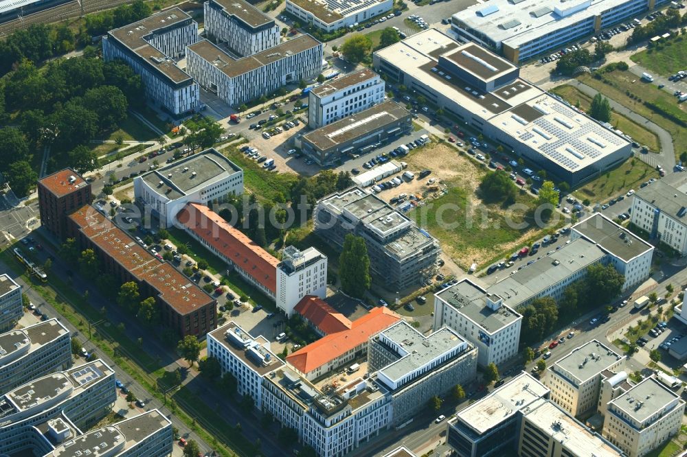 Berlin from above - Construction site to build a new office and commercial building on Ernst-Augustin-Strasse in the district Adlershof in Berlin, Germany