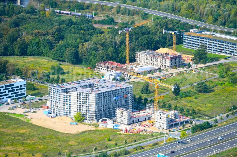 Schönefeld from the bird's eye view: Construction site to build a new office and commercial building FLEXGATE on Kienberger Allee Ecke Am Flughafen in Schoenefeld in the state Brandenburg, Germany